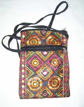 ZARI EMBROIDERY BORDER MOBILE BAG