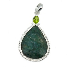 Emerald Gemstone Colored Fashion Pendant, Occasion : Wedding