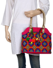 Rajrang Stitched Woman Holding Bag