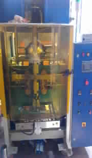 Vertical Collar Type Packing Machine With Volmetric Cup Filler