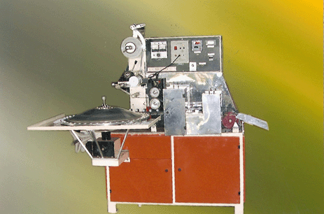 FLAT LOLLIPOPS SACHET PACKING MACHINE