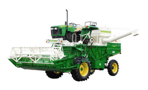 Tractor driven combine harvester