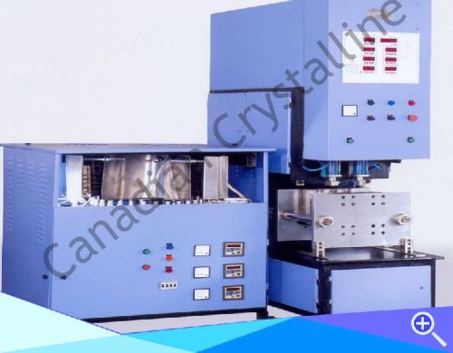 SEMI AUTOMATIC PET BLOWING MACHINE