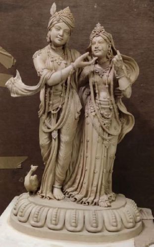 Marble Brown Radha Krishna Statue, For Dust Resistance, Shiny, Pattern : Carved
