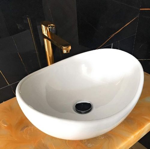 Ceramic Polished Table Top Wash Basin, For Home, Hotel, Office, Restaurant, Feature : Durable, Fine Finishing