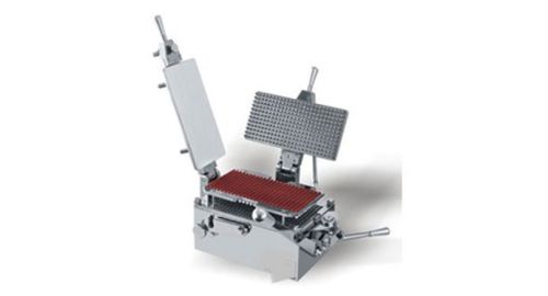 MANUALLY OPERATED CAPSULE FILLING MACHINE