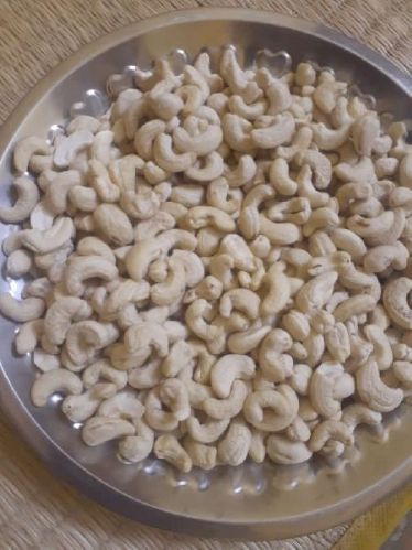 Sarvam Curve Cashew Nuts (W320), For Food, Snacks, Packaging Type : Pouch, Tinned Can