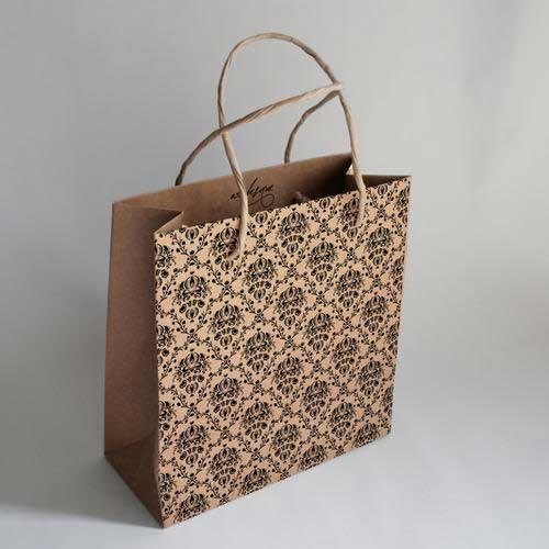 Designer Paper Bags, For Gift Packaging, Shopping, Capacity : 1kg, 5kg