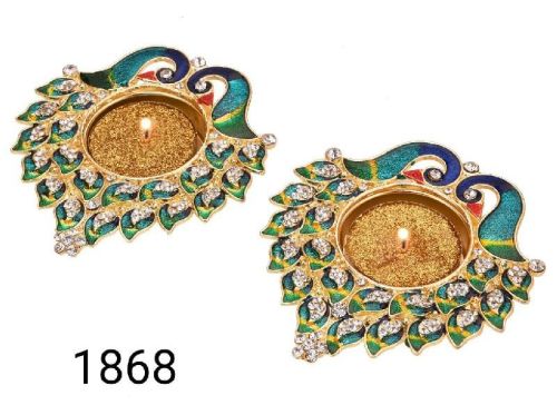 Decorative Diyas, Peacock Diyas, For Pooja, Feature : Corrosion Proof, Fine Finishing, Good Design