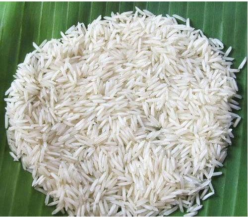 Hard Common HMT Boiled Rice, For Cooking, Food, Human Consumption, Feature : Gluten Free