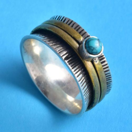 Moonstone Hammer Spinner Divine Ring, Occasion : Party Wear, Wedding Wear