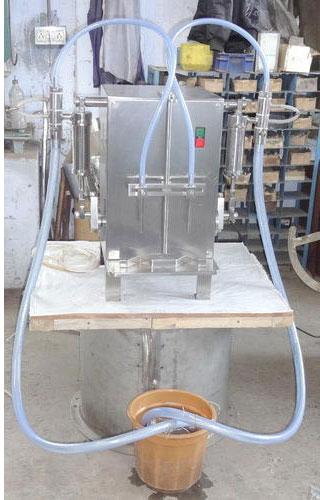 RIDDHI Semi-Automatic Electric Volumetric Bottle Filling Machine