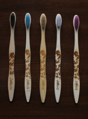 Jeeva Laser Engraved Bamboo Toothbrush, For Cleaning Teeths, Feature : Durable