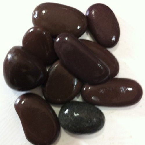 Polished Brown Pebble Stone, For Staircase, Walls Flooring, Feature : Crack Resistance, Stain Resistance