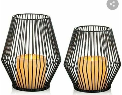 Polished Black Metal Candle Holder, For Non Breakable, Good Quality, Mounting Type : Tabletop, Wall Mount