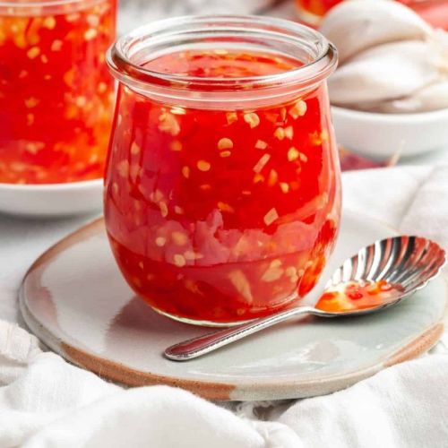 Sweet and Spicy Red Chilli Sauce, For Food Use, Speciality : Rich In Color