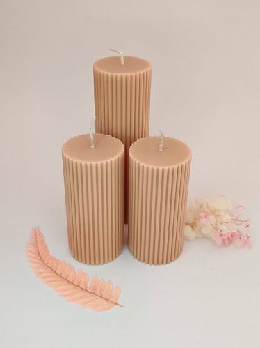 Polished Paraffin Wax Roman Pillar Scented Candle, For Lighting, Decoration, Speciality : Smokeless