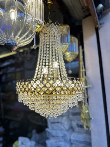 Polished Crystal Chandelier, For Home, Hotel, Restaurant, Feature : Attractive Designs, Fine Finishing