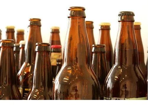 GMO Amber Glass Bottle, For DrinkWare Packaging, Shape : Round