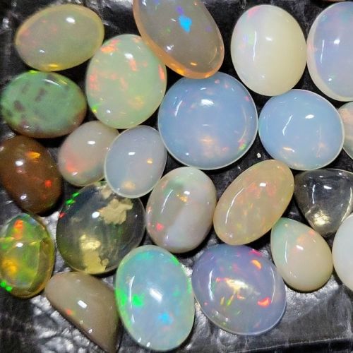 Oval Ethiopian Fire Opal Loose Gemstone, Color : White, Rainbow