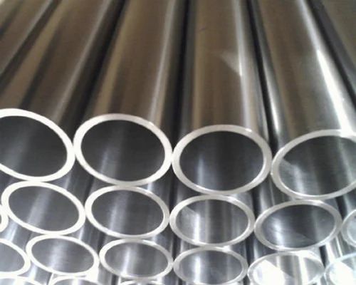 Silver Round Polished Stainless Steel Seamless Pipe, For Water Treatment Plant, Construction