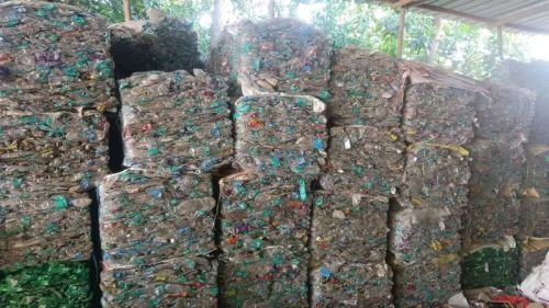 Light Blue Used PET Bottles Scrap, For Personal Care., Style : Crushed