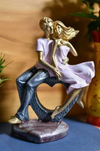 Polyresin Dil Couple Statue, For Interior Decor, Speciality : Attractive Look, Nice Finish