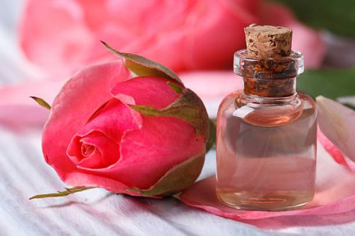 Yellow Liquid Rosa Damascena Rose Essential Oil, For Medicals Use, Cosmetics, Feature : Nice Fragrance