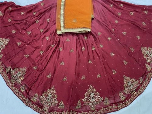 Ladies Fancy Maroon Embroidered Lehenga Choli, Feature : Skin Friendly, Impeccable Finish, Easily Washable