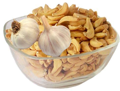 Dehydrated Garlic Flakes, For Cooking, Snacks, Style : Dried