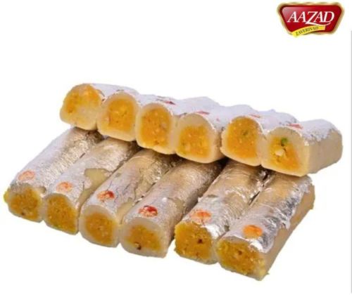 AAZAD KAJU ORANGE ROLL, Taste : Sweet