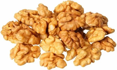 Golden Yellow Organic Walnut Kernels, For Bakery, Chacolate, Food, Health Care, Milk Shakes, Style : Dried