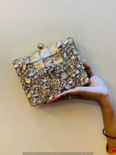 Metal Embellished Handcrafted Brass Clutch, Feature : Natural Seashell