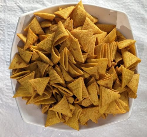 Shraddha Yellow Masala Triangle Chips, For Snacks, Style : Fried