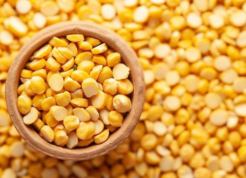 Yellow Natural Split Bengal Gram, For Cooking, Human Consumption, Certification : Fssai