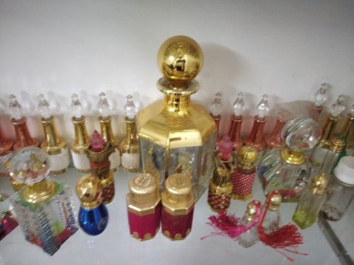 Transparent 100-500gm Glass Attar Bottles, For Storing Liquid, Feature : Fine Quality