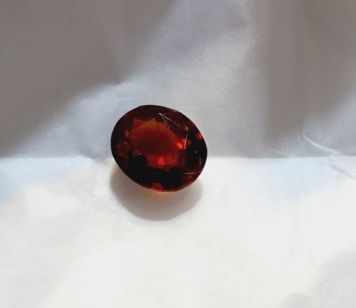 Oval Polished 9 Carat Hessonite Gemstone, For Jewellery, Size : Standard