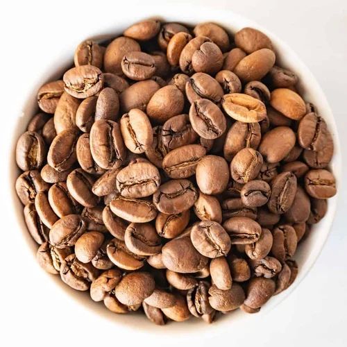 Brown Roasted Common Light Roast Coffee Beans, For Beverage, Purity : 100%