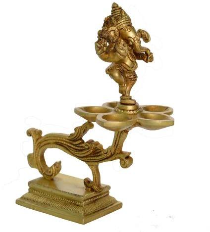 Golden Polished Brass Ganesha Oil Lamp, For Home Decor, Temple Decor, Feature : Fine Finished