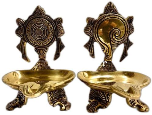 Brass Shanku Chakra Oil Lamp, For Home Decor, Temple Decor, Feature : Fine Finished