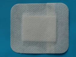 White Adhesive Non Stick Mesh Wound Dressing, For Clinical, Hospital, Feature : Disposable