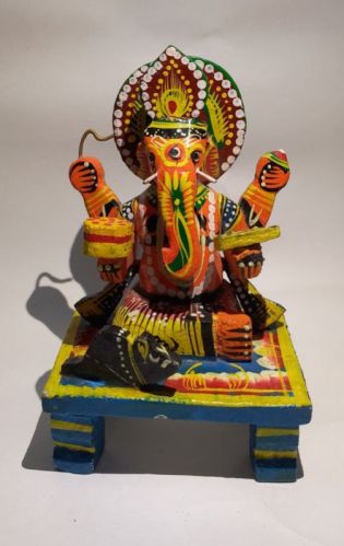 Polished Ganesha Wooden Craft, For Gifting, Decoration, Feature : Shiny Look, Attractive Designs