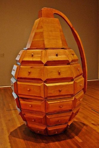 Polished Hardwood Grenade Form Multi Drawer Art Cabinet