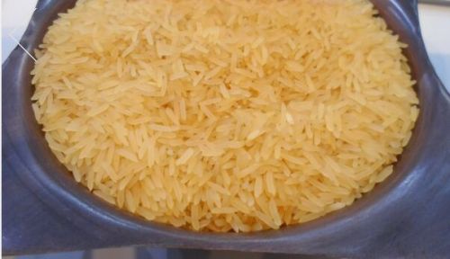 Soft Natural Sharbati Golden Sella Rice, Style : Long Grain