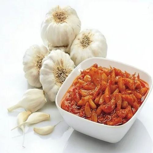 Garlic Pickle, For Human Consumption, Feature : High Quality, Natural Taste