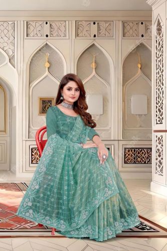 Parvati Fabrics Ladies Fancy Nylon Sarees, Feature : Easy Washable, Stone Work