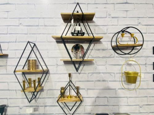 Polished Metal Decorative Wall Shelves, For Home, Office, Feature : Attractive Design, Fine Finishing