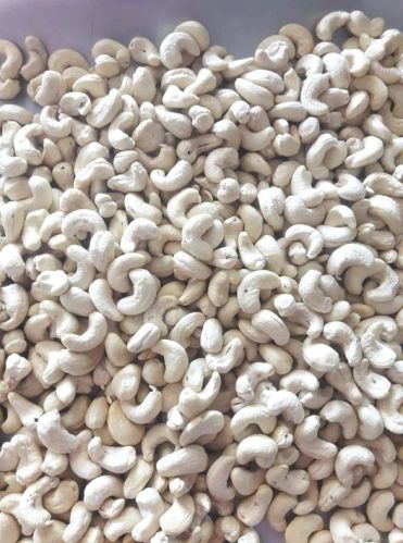 Fried Natural Raw Cashew Nuts, Shape : Curve, Packaging Type : White