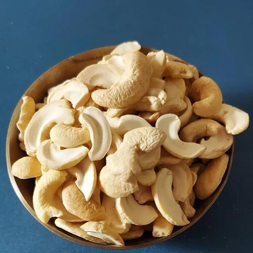 White Half Split Cashew Nuts, For Food, Snacks, Packaging Type : Plastic Packet