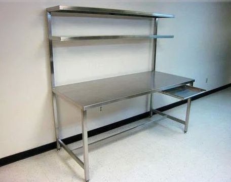 Control and Packing Table With Two Shelves